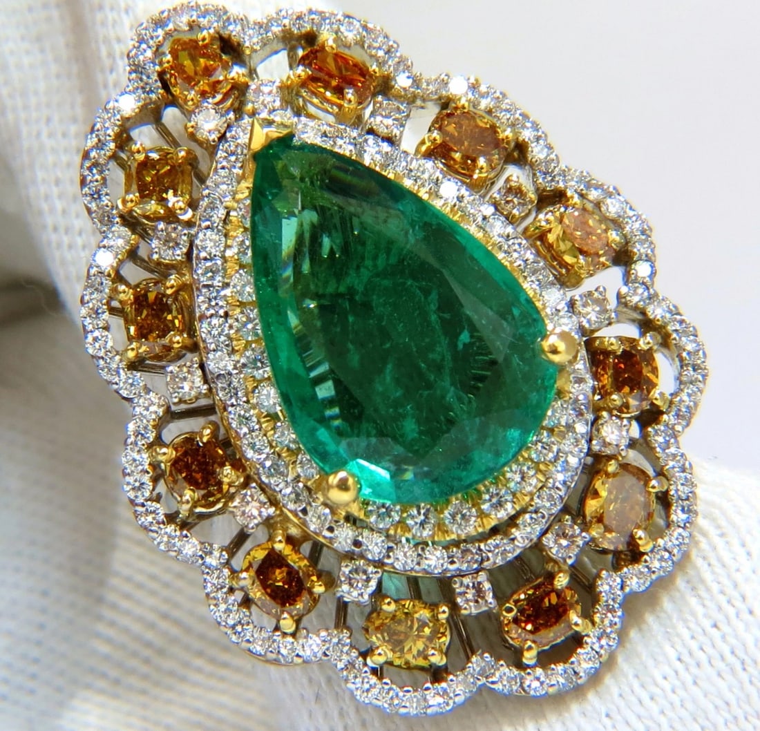 GIA Certified 12.77ct natural emerald fancy colors cocktail diamond ring 18kt+: Title: GIA Certified 12.77ct natural emerald fancy colors cocktail diamond ring 18kt+ Description: Green Pear Allure. 8.63ct. Natural GIA Certified Emerald Ring GIA Certified Report ID: 5161616364 18.