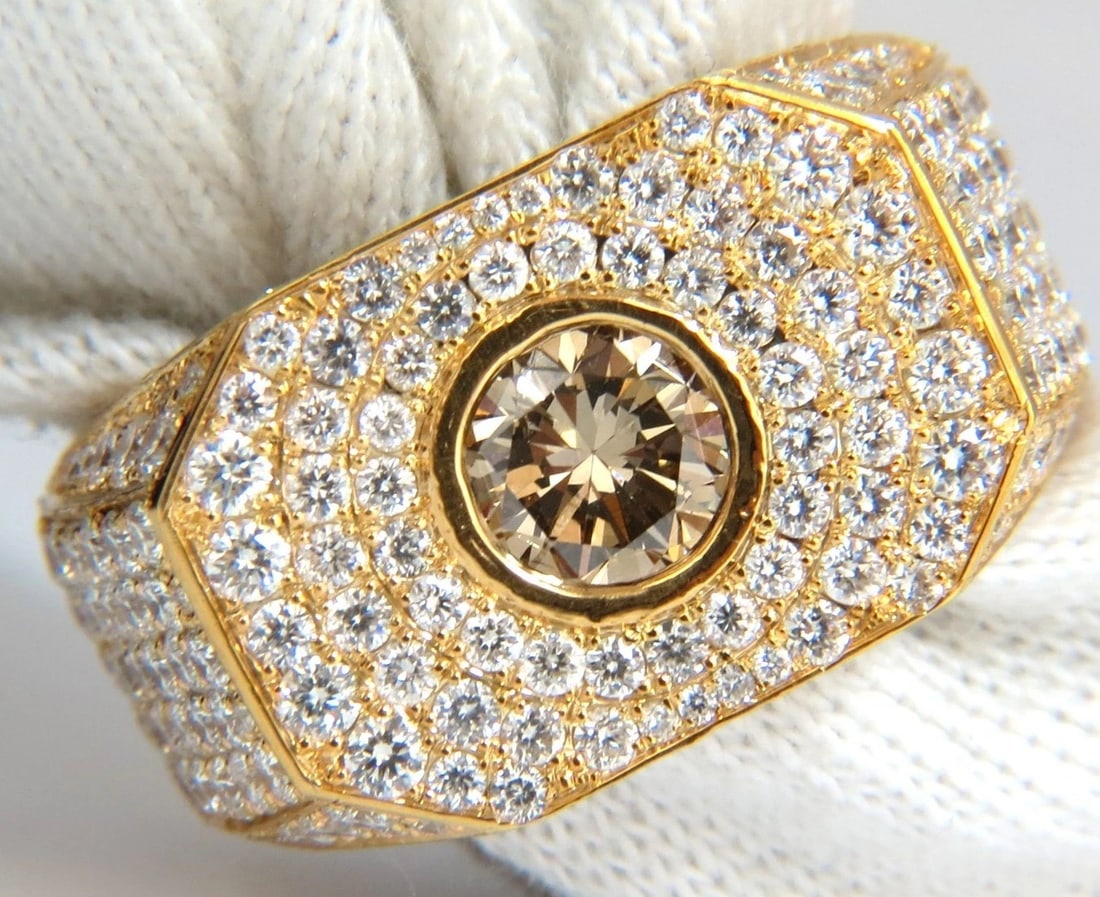 5.60ct. mens natural fancy light brown diamond master bead set pave ring +: Title: 5.60ct. mens natural fancy light brown diamond master bead set pave ring + Description: Men's Light brown diamond & Bead set pave diamonds ring. 1.10ct. center light brown diamond. Round Cut Vs