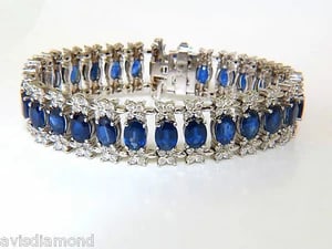 33.75CT NATURAL GEM SAPPHIRE DIAMOND BRACELET 3 ROW & WIDE CUFF 14KT**: Title: 33.75CT NATURAL GEM SAPPHIRE DIAMOND BRACELET 3 ROW & WIDE CUFF 14KT** Description: 28.00ct. Natural Sapphires vivid royal blue transparent and full cut ovals clean clarity 5.75ct. Diamonds Bri