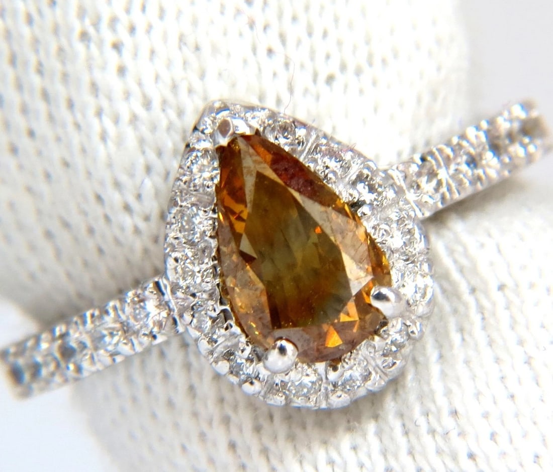 1.60ct. natural fancy color yellow brown diamonds halo ring 14kt +: Title: 1.60ct. natural fancy color yellow brown diamonds halo ring 14kt + Description: Sparkling Golden Yellow Browns Flash Fancy color Pear cut Diamond ring. Natural Fancy color Center diamond: 1.10c