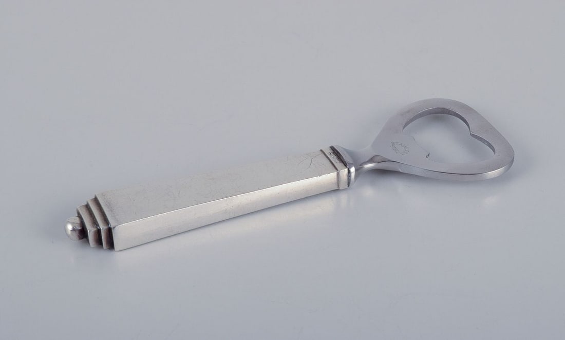 Georg Jensen Pyramid. Bottle opener in sterling silver and stainless steel.: Title:Georg Jensen Pyramid. Bottle opener in sterling silver and stainless steel. Description:Georg Jensen Pyramid. Bottle opener in sterling silver and stainless steel. Hallmark: After 1944. Perfect