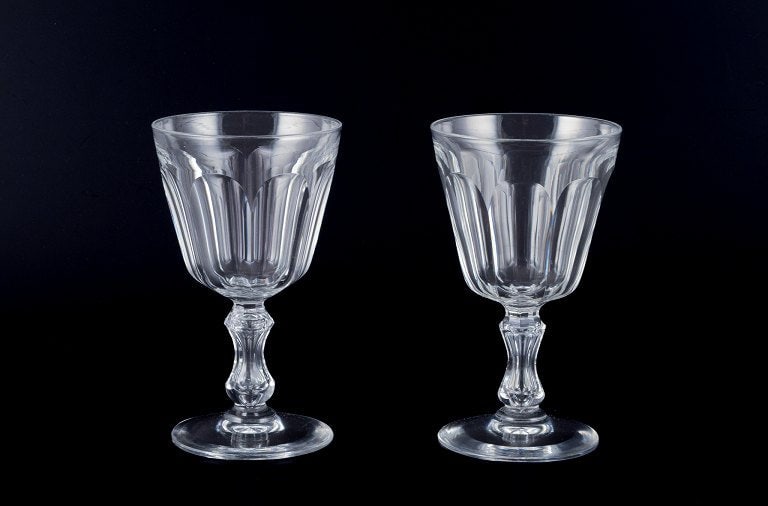 Val St. Lambert, Belgium, two "Lalaing" red wine glasses in clear faceted cut crystal glass.: Title:Val St. Lambert, Belgium, two "Lalaing" red wine glasses in clear faceted cut crystal glass.Description:Val St. Lambert, Belgium, two "Lalaing" red wine glasses in clear faceted cut crystal