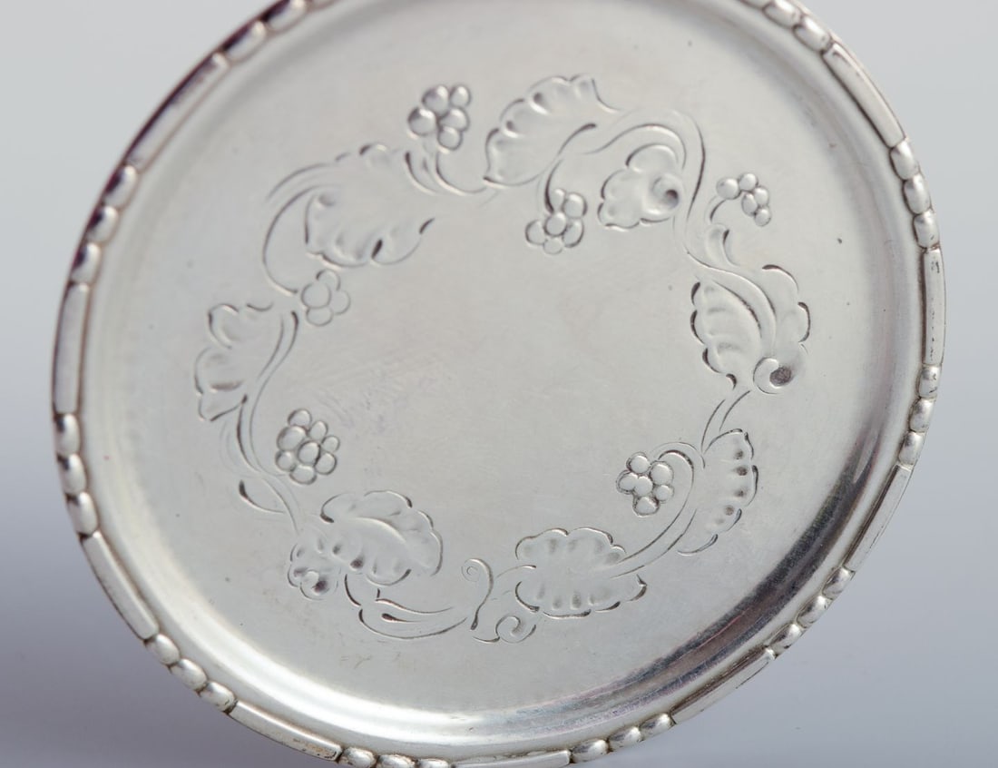 Georg Jensen, a set of six glass coasters in sterling silver. - 6