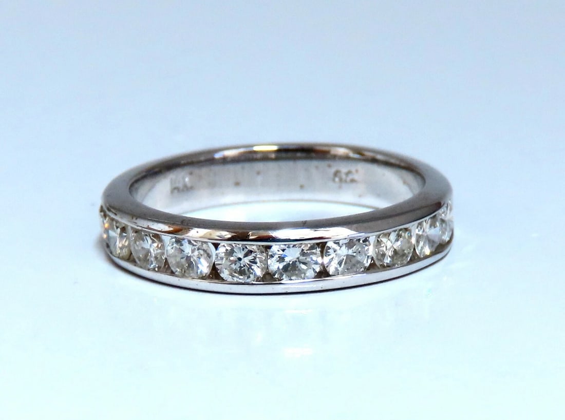 .70ct Natural Round Cut Diamonds Channel Band 14kt Gold 4MM**: Title: .70ct Natural Round Cut Diamonds Channel Band 14kt Gold 4MM** Description: MAGNIFICENT JEWELS .70ct. Natural Round Cut Diamonds band I color / Si-1 clarity Channel Set 4.2 grams Size 8 and
