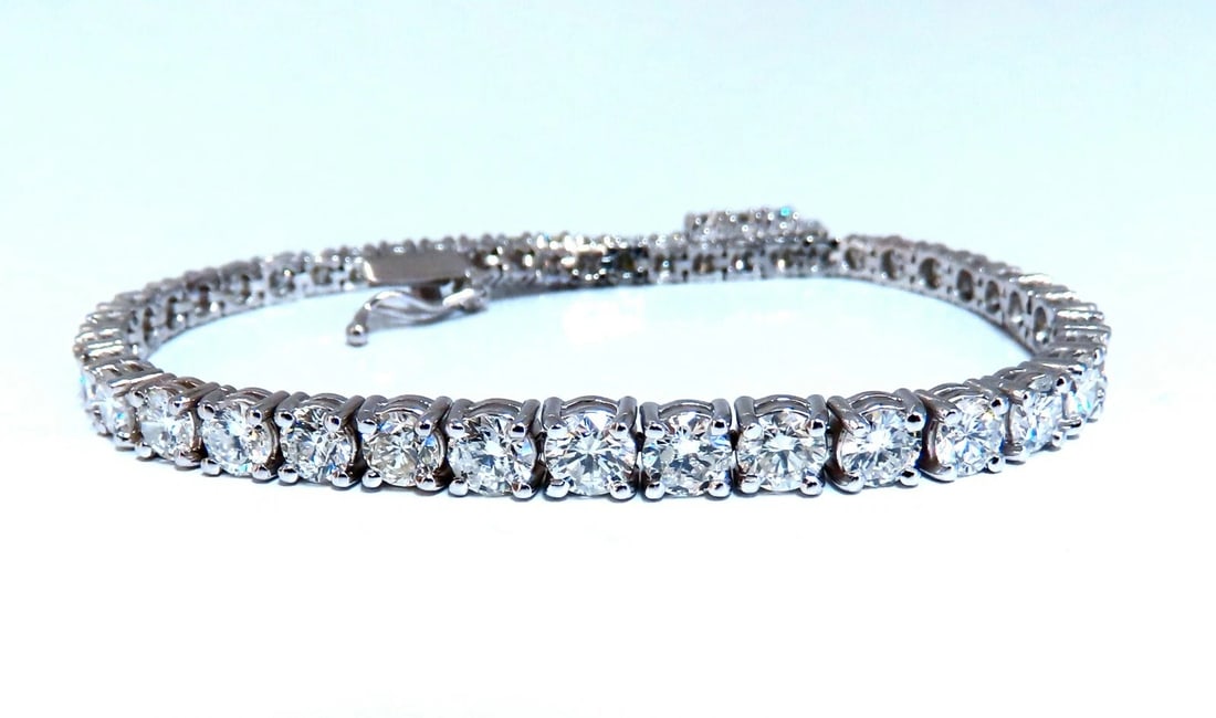 6.43ct Natural Diamonds Tennis Bracelet 14kt Gold Classic Graduated Caliber**: Title: 6.43ct Natural Diamonds Tennis Bracelet 14kt Gold Classic Graduated Caliber** Description: Classic Tennis, Graduated Caliber 6.43ct. Natural diamonds bracelet. Round, full cuts G color Vs-2 Si-