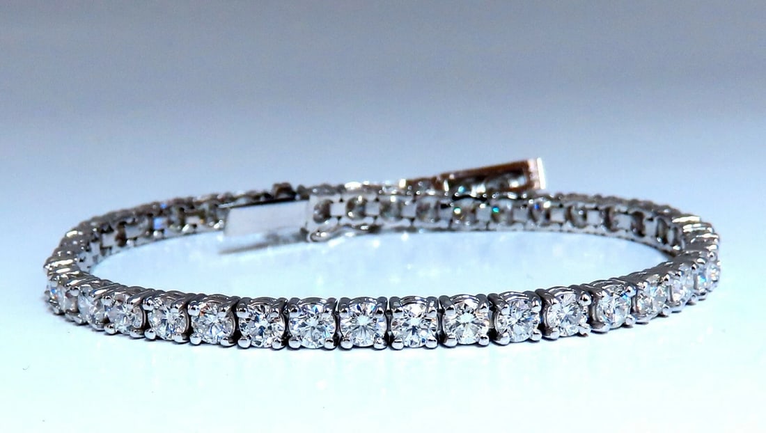 6.65ct Natural Diamonds Tennis Bracelet 14kt Gold Classic Riviera**: Title: 6.65ct Natural Diamonds Tennis Bracelet 14kt Gold Classic Riviera** Description: Classic Tennis 6.65ct. Natural diamonds bracelet. Round, full cuts G color Vs-2 Si-1 clarity. 14kt. white gold 9