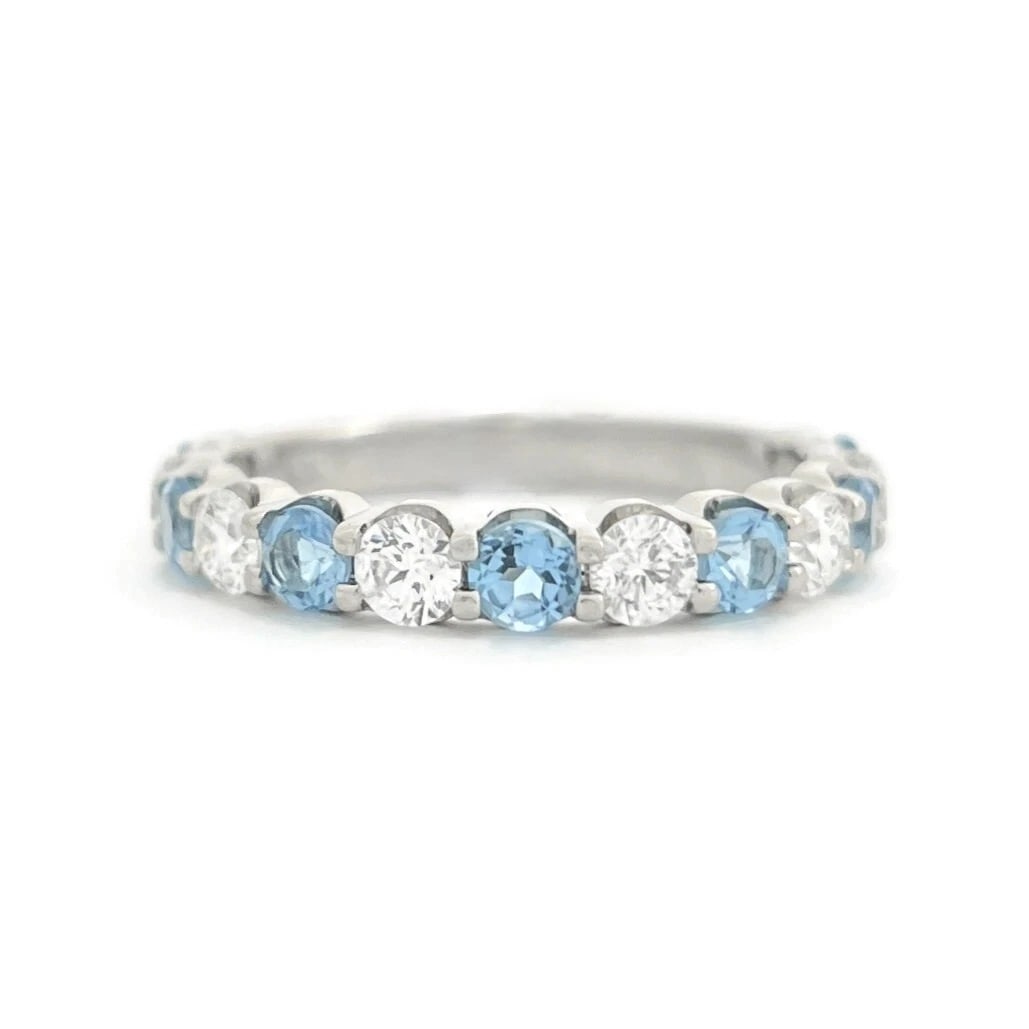 Blue Topaz Diamond Gemstone Wedding Band Ring 14K White Gold 1.44 CTW: Blue Topaz Diamond Gemstone Wedding Band Ring 14K White Gold 1.44 CTW This is a lovely ring that can be worn as a wedding band, anniversary ring or statement ring. Don't hesitate to ask any