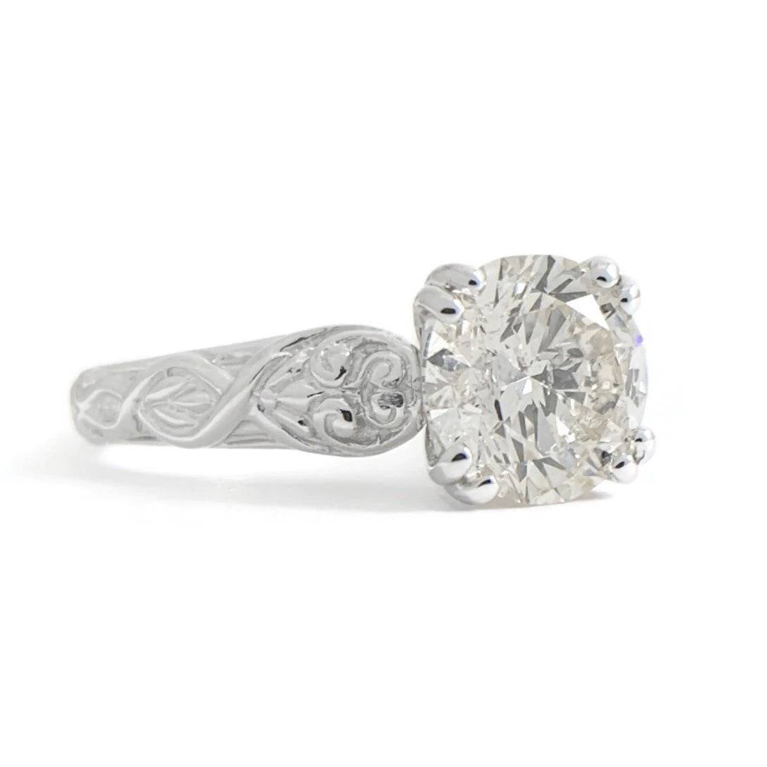 Textured Round Solitaire Diamond Engagement Ring 14K White Gold 1.50 CT: Textured Round Solitaire Diamond Engagement Ring 14K White Gold 1.50 CT This is a gorgeous diamond engagement ring! Please let us know if you have any questions! Diamonds: 1 round brilliant cut 1.50 c