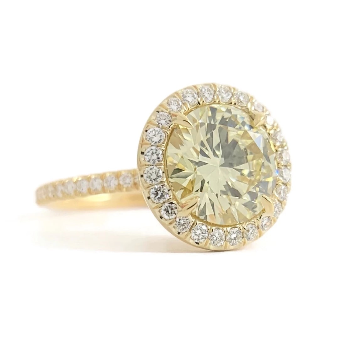 GIA Round Halo Yellow Diamond Engagement Ring 18K Yellow Gold 2.41 CTW: GIA Round Halo Yellow Diamond Engagement Ring 18K Yellow Gold 2.41 CTW This is a gorgeous diamond engagement ring! Please let us know if you have any questions! Diamonds: 2.41 ctw; 1 round brilliant c