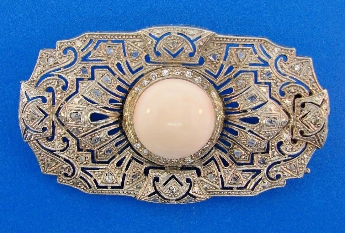 ART DECO Platinum, Angel Skin Coral & Diamond Brooch Circa 1920s: Title: ART DECO Platinum, Angel Skin Coral & Diamond Brooch Circa 1920sDescription: Platinum, Coral & Diamond Brooch Antique · This is a most for a collector. The weight is 16.1 grams. The