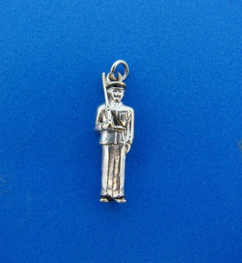 TIMELESS Art Deco Platinum & Enamel Soldier Charm Circa 1920s: Title: TIMELESS Art Deco Platinum & Enamel Soldier Charm Circa 1920sDescription: Art Deco Platinum & Enamel Soldier Charm Circa 1920s · Wonderful charm that is a necessity in your collection. 
