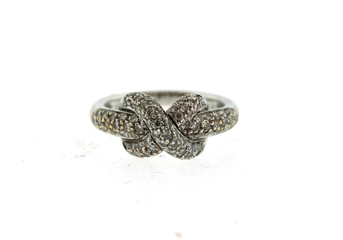 NICE 18k White and Yellow Gold & Micro Pave Diamond X Knot Ring: Title: NICE 18k White and Yellow Gold & Micro Pave Diamond X Knot Ring Description: 18k Gold & DiamonItalian Ring This unique and exciting ring is circa 1950 and is stamped with makers mark (faint but