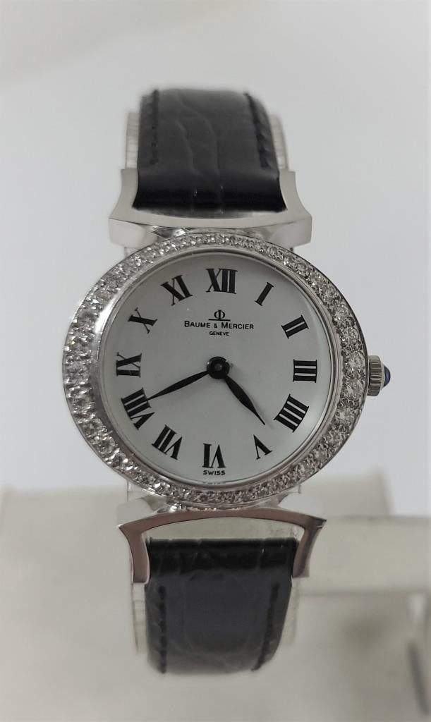 Solid 18k White Gold Ladies BAUME & MERCIER Watch Factory Set Diamonds 36646* EXLNT: Solid 18k White Gold Ladies BAUME & MERCIER Watch with Factory Set Diamonds & Fancy Logs* 36646* EXLNT​​​ Great present for yourself or someone you love as well as for vintage collec