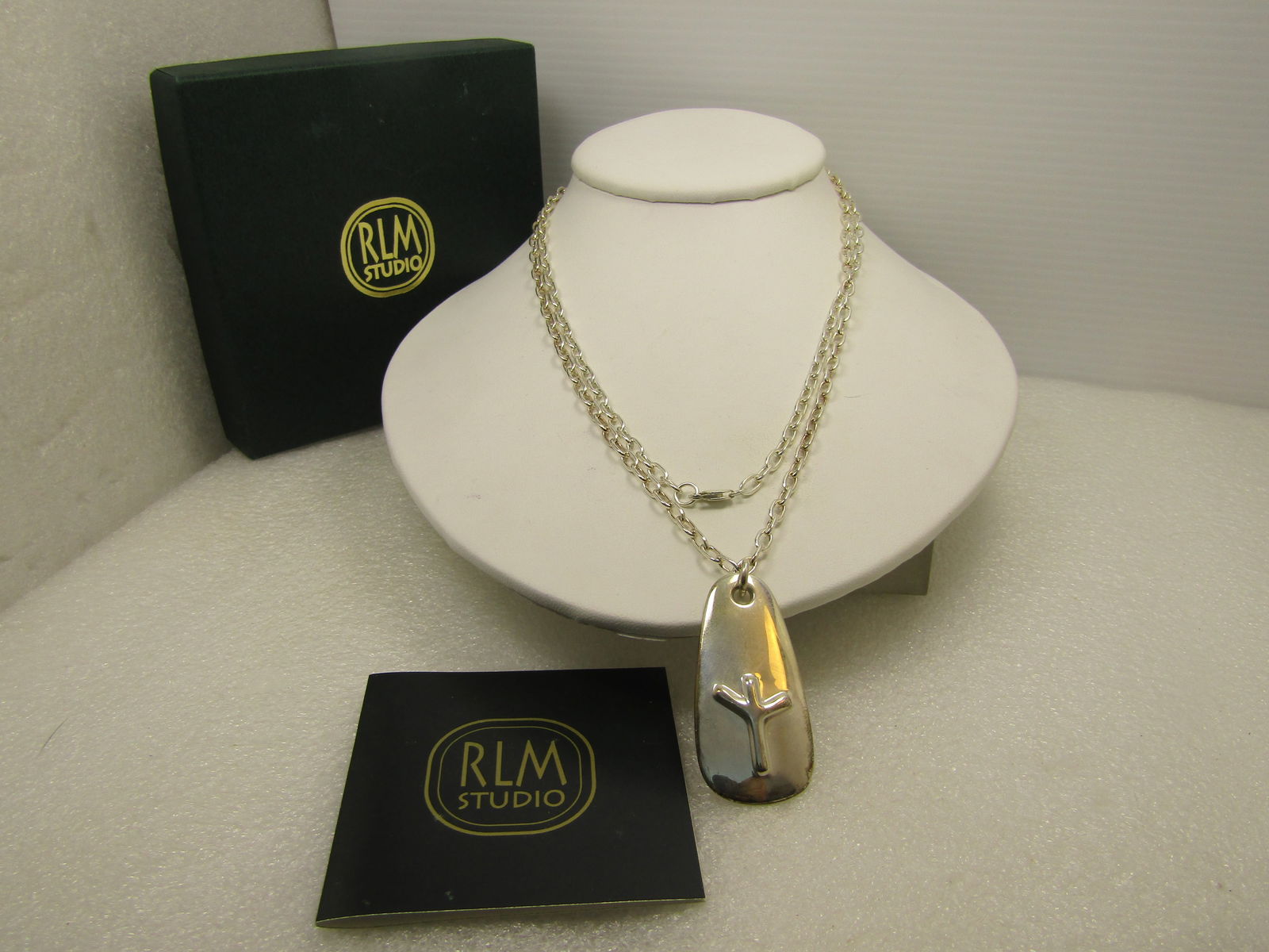 Vintage Sterling RLM Viking Elk Symbol Necklace, 36", Original Box/Pouch, 1990's.: Sterling necklace that is 26" long with a pendant with antler like repousse figure and on the back, RLM Studio .925 "Elk" Protecton from Evil". The pendant is appx. 1.75" tall and 7/8" wide at the