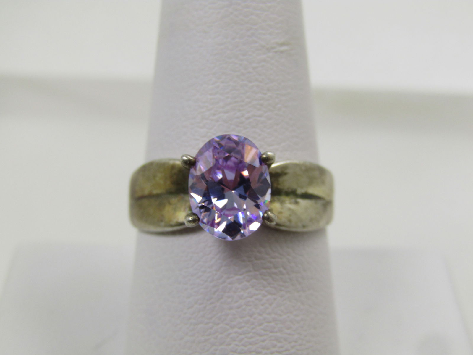 Vintage Sterling Lavender Stone Ring, Sz. 9. 1970's-1980's, Signed (M): Vintage Sterling Lavender Stone Ring, Sz. 9. 1970's-1980's, Signed (M). The stone is believed to be a crystal or glass stone. It is a faceted oval stone that is appx. 9mm by 6.5mm and prong-set