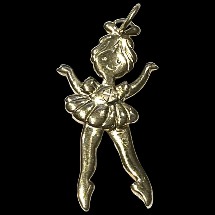 Vintage Gold Tone Articulated Dancing Ballerina Pendant/Charm: Title: Vintage Gold Tone Articulated Dancing Ballerina Pendant/Charm Description: Vintage Gold Tone Articulated Dancing Ballerina Pendant/Charm Hallmarked: No Hallmark SeenWeighs: 2.3 grams Measures