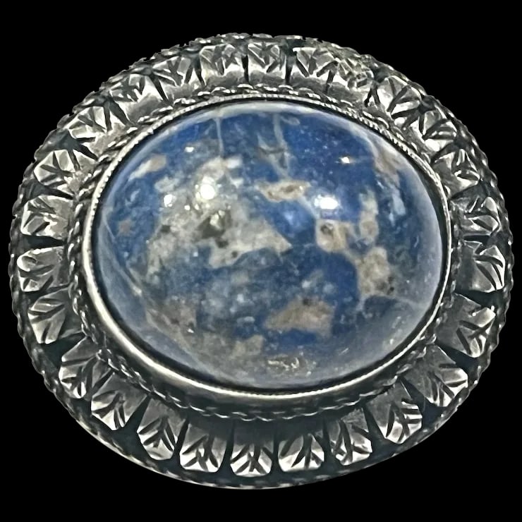 Vintage 800 Silver Lapis Brooch: Title: Vintage 800 Silver Lapis Brooch Description: Vintage 800 Silver Lapis BroochHallmarked: 800Weighs 7.3 gramsMeasures Approx. 1.25 x 1 inches Reserve: $95.00 Shipping: Domestic: Flat-rate of $6.0