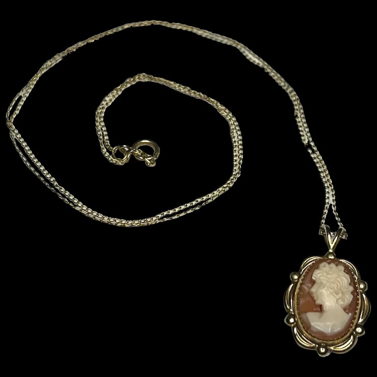 Vintage 14k GF Cameo Necklace: Title: Vintage 14k GF Cameo Necklace Description: Vintage 14k GF Cameo NecklaceHallmarked 1/20 14k GFCostume JewelryWeighs 2 gramsPendant Measures Approx. 1 x .50 inches Chain Measures 19 inches Reser