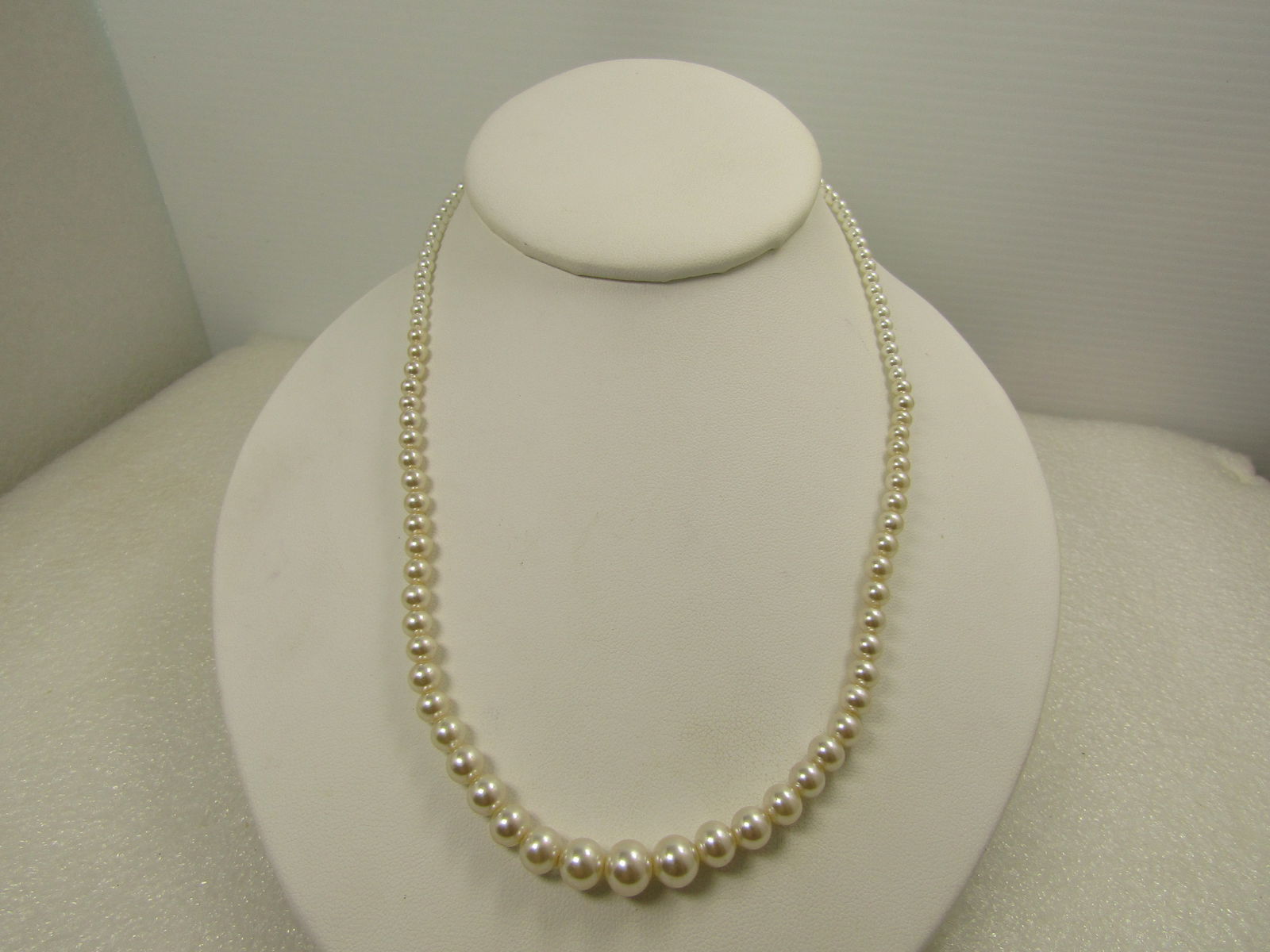 Vintage Graduated Pearl Necklace, Sterling Filigree Box Clasp, 18" Signed G, 1970's-1980's: Vintage Graduated Pearl Necklace, Sterling Filigree Box Clasp, 18" Signed G, 1970's-1980's . The pearls are white in their orient and are believed to be cultuured. They range from 3mm to 7.5mm. 