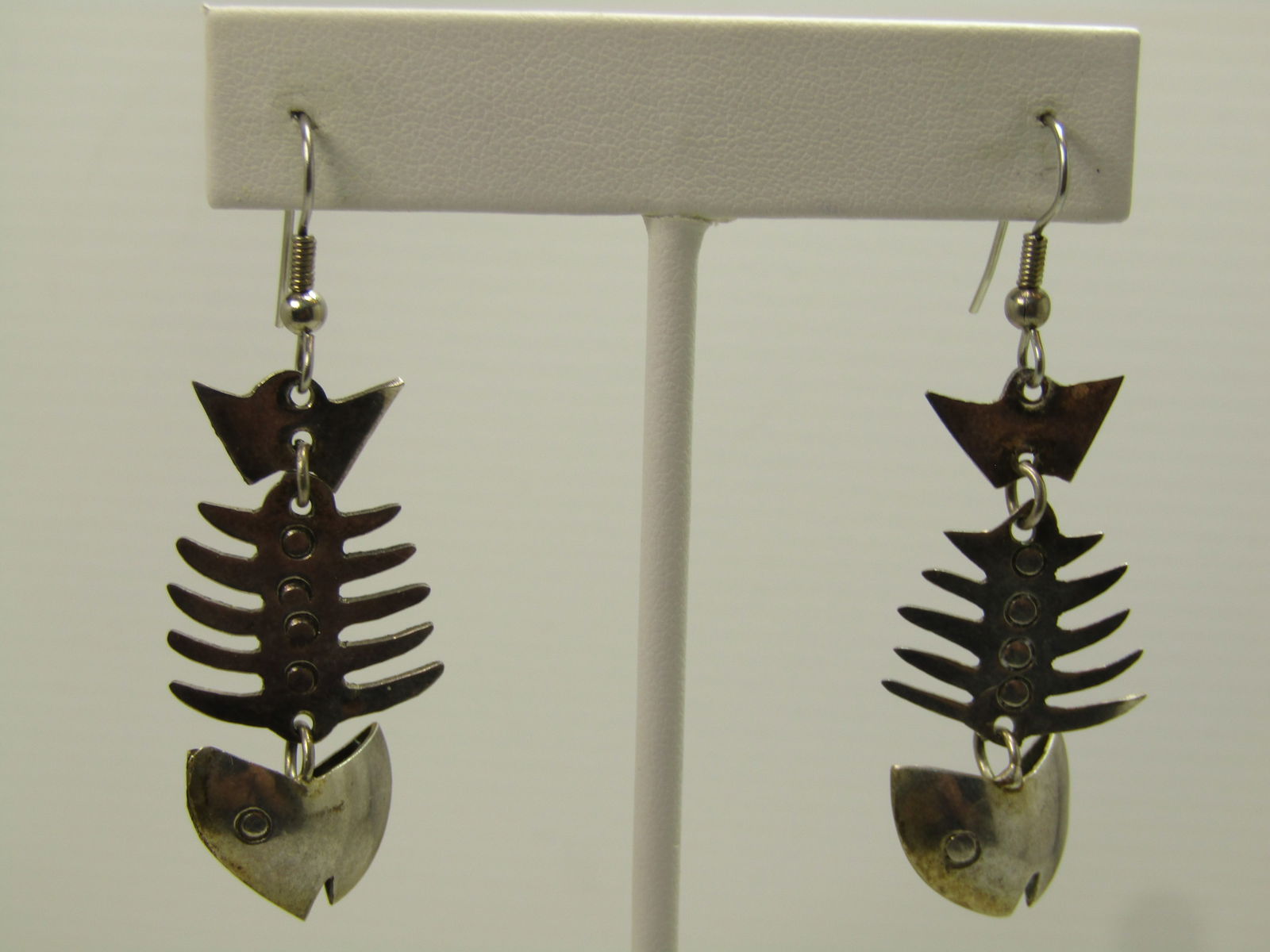 Vintage Fish Skeleton Earrings, Pierced/Dangle, Mexico, 1970's: Vintage Fish Skeleton Earrings, Pierced/Dangle, Mexico, 1970's. Silver tone with the look of sterling but do not test as sterling - rounded head with attached rib cage and tail - this is three section