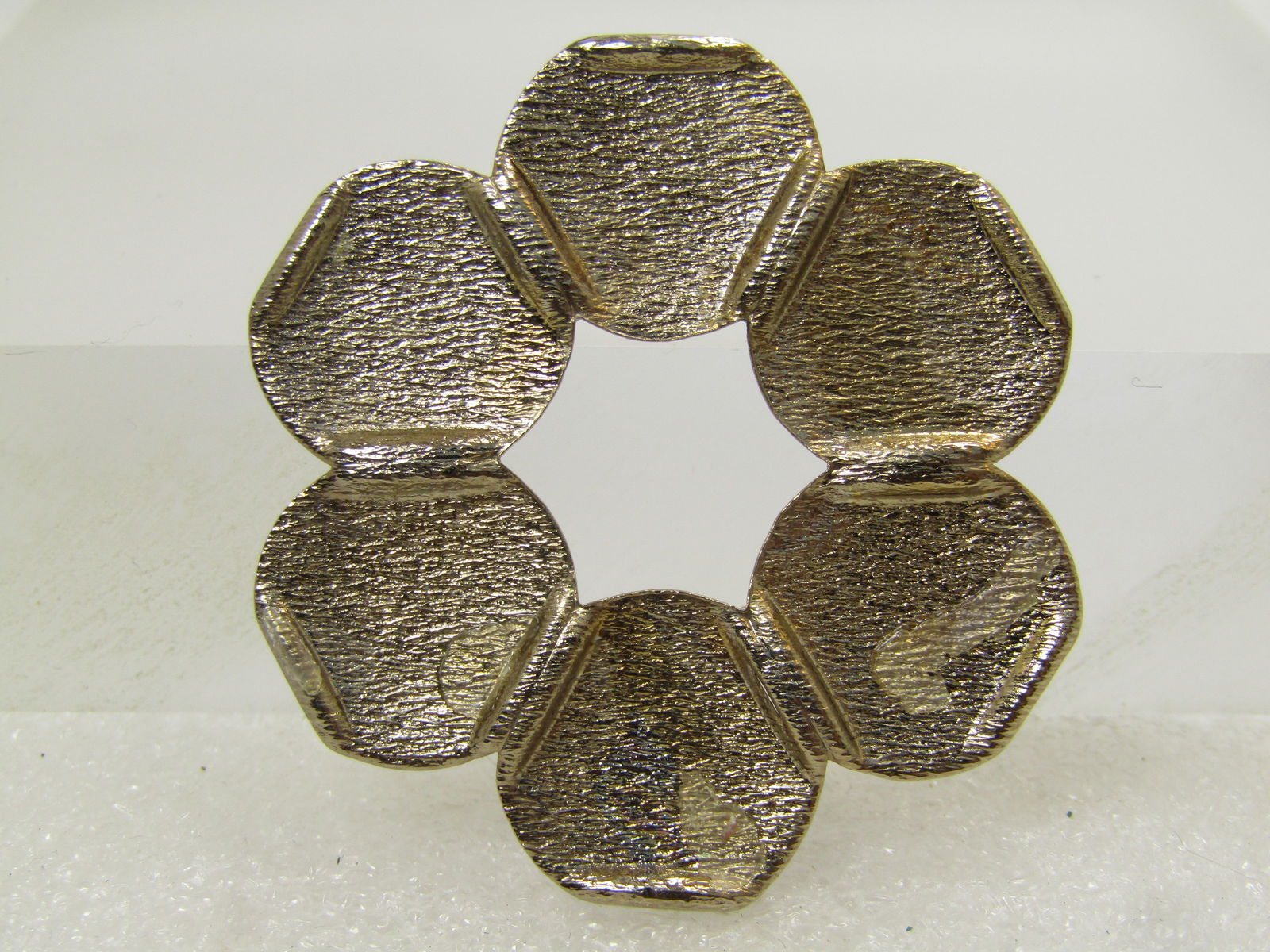 Vintage Faux Pearl Mod Tassel Brooch, 1960's-1970's: Vintage Faux Pearl Mod Tassel Brooch, 1960's-1970's. The tassel was not attached in the photo but is there. This has a mod leaf design with textured surfaces and raised shiny grid-like design over the