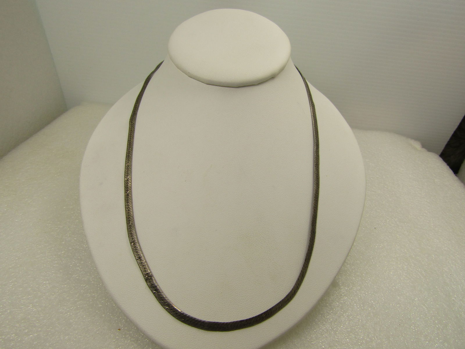 Vintage Sterling Star Herringbone Necklace, 20" Signed Vior, 1980's: Vintage Sterling Star Herringbone Necklace, 20" Signed Vior, 1980's. This is appx. 4mm wide with a beveled edge on each side with somewhat of a textured finish with stars stamped every half inch throu