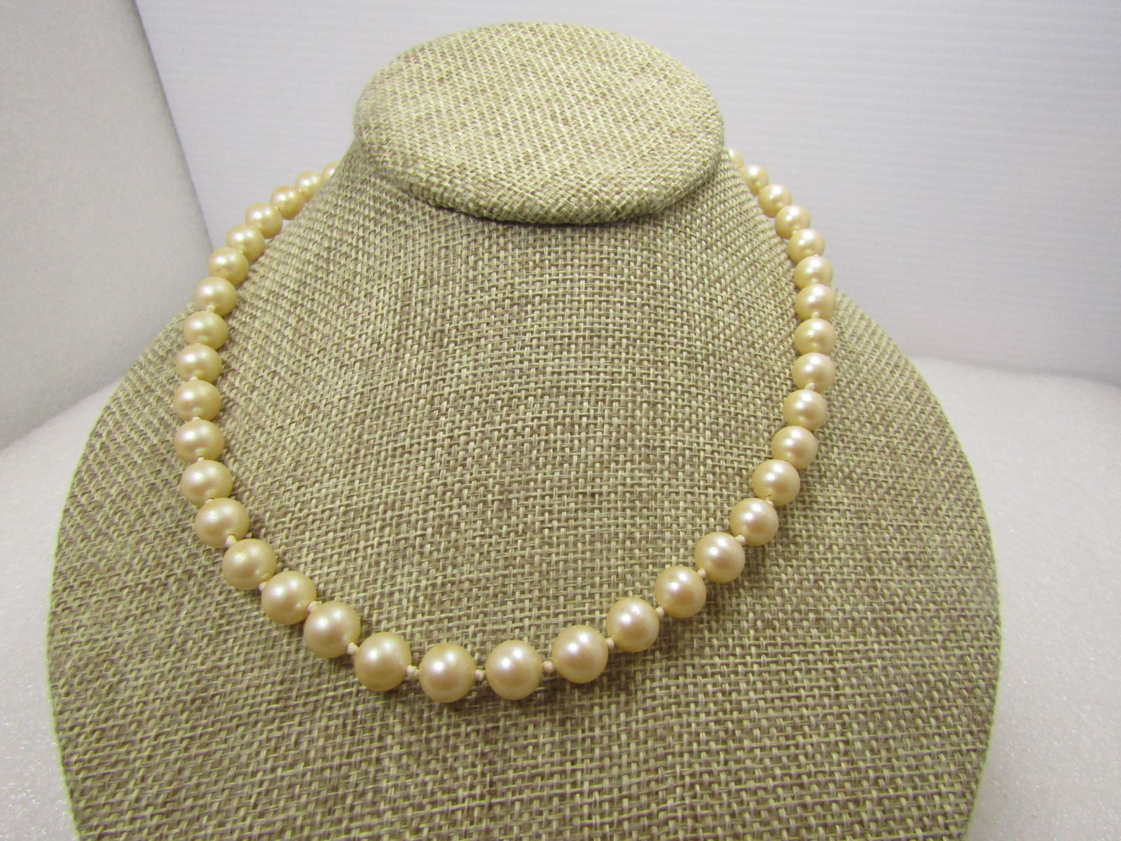 Vintage Knotted Pearl Necklace, 7.8mm, 24", Sterling Filigree Clasp, 1940's: Vintage Knotted Pearl Necklace, 7.8mm, Sterling Filigree Clasp, 1940's. 24". The pearls could be cultured pearls - not known for certain. They do not have wear on them and this is in very good