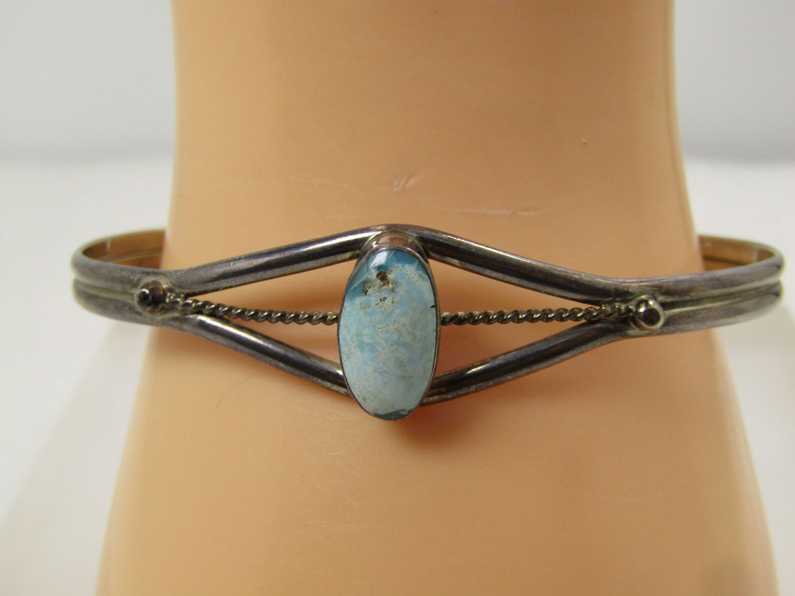 Vintage Sterling Tuquoise Cuff Bracelet, Possibly Amazonite, 7.5", 1960's-1970's: Vintage Sterling Tuquoise Cuff Bracelet, Possibly Amazonite/Larimar, 7.5", estimated at1960's-1970's. The stone has the look of turquoise - just not sure it is given the lighter color - looking more