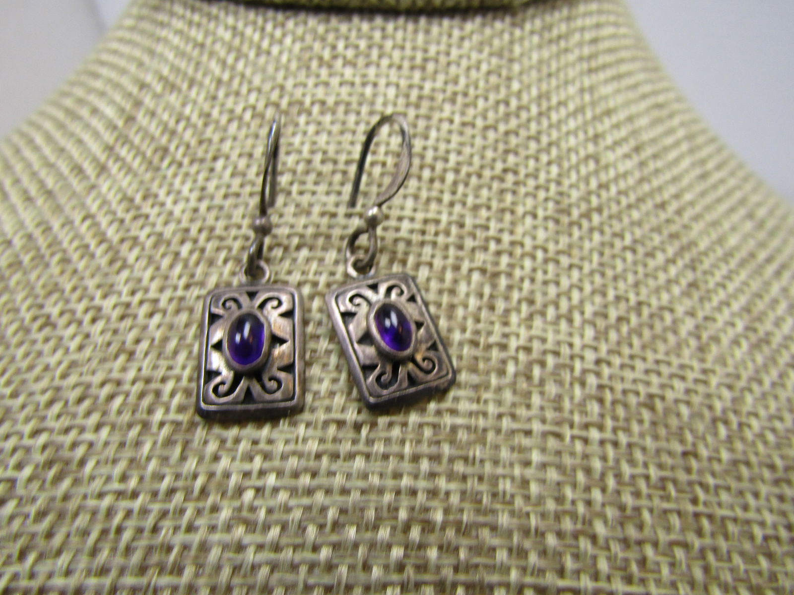 Vintage Sterling Amethyst Drop Earrings, Signed Boma. 1980's-1990's: Vintage Sterling Amethyst Drop Earrings, Signed Boma. 1980's-1990's. These have a sterling hook post, signed .925 and signed .925 on the drop as well. It is a rectangular open scrolled 5/8" tall and 1