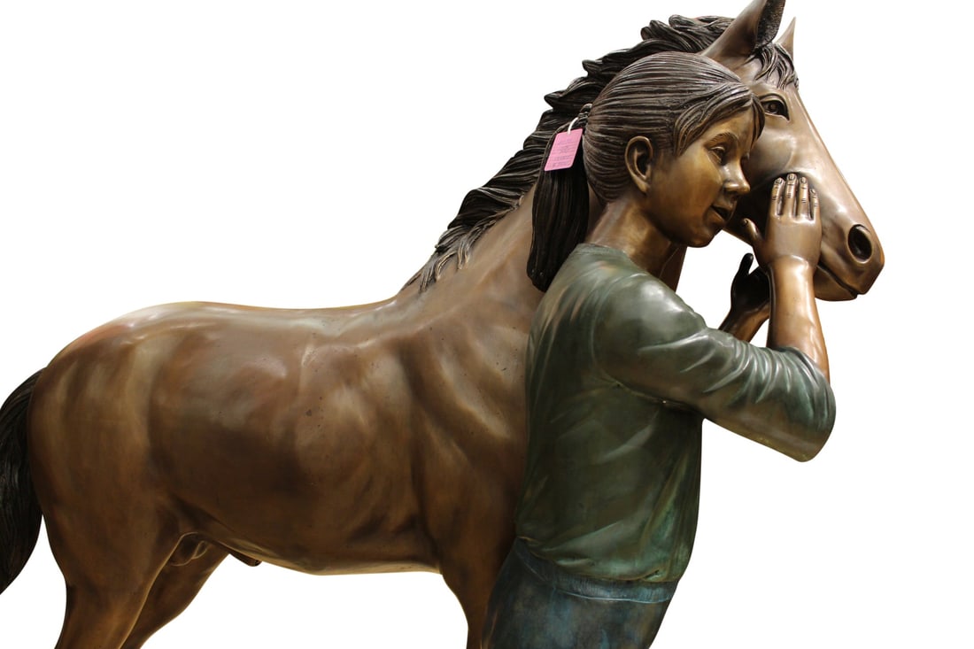 Young Girl and her pony Bronze Statue - Size: 48"L x 20"W x 48"H.: Title:Young Girl and her pony Bronze Statue - Size: 48"L x 20"W x 48"H.Description:This statue depicts a multi-toned bronze garden statue of a young girl and her pony. The little girl's detailed