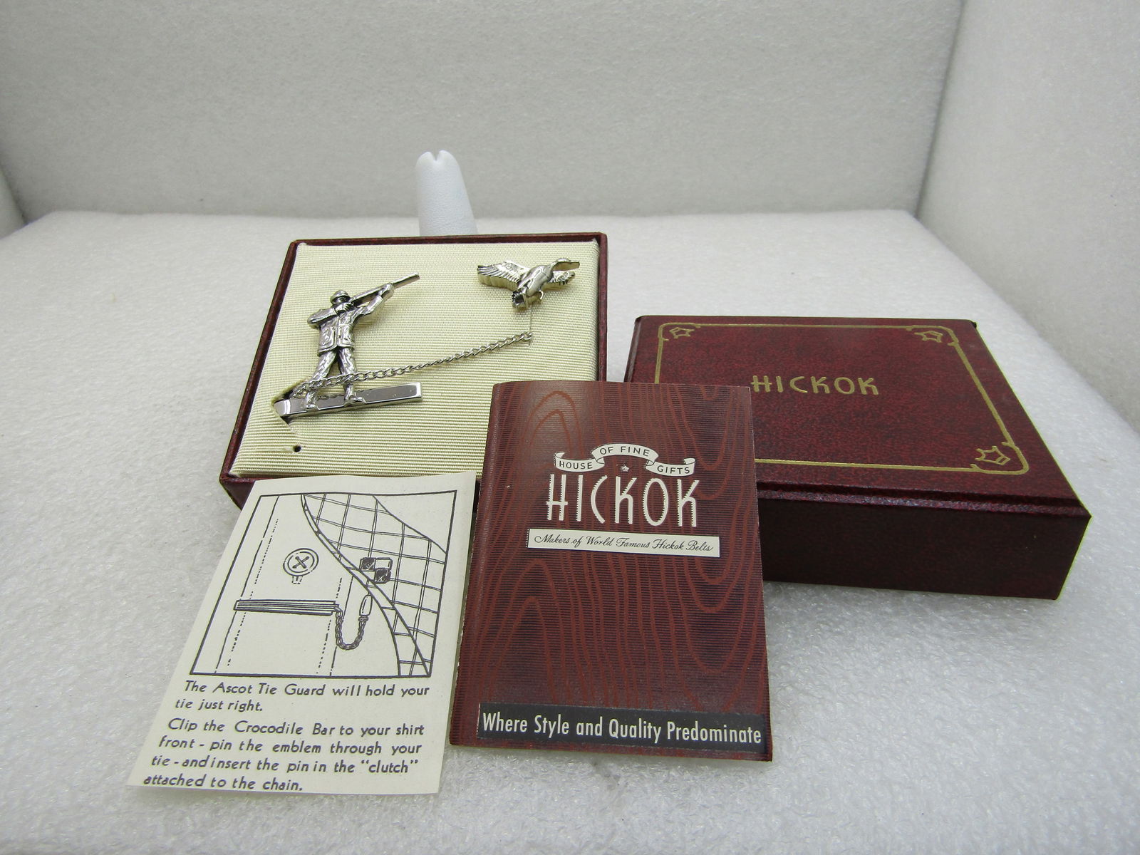Vintage Hickok Duck Hunter & Duck Tie Clasp & Tack Pin, Original Box: Vintage Hickok Duck Hunter & Duck Tie Clasp & Tack Pin, Original Box with enclosure card. Mid-Century. New Condition. 1.25" wide and tall on the hunter with chain and 1" duck. Very good condition. (IN