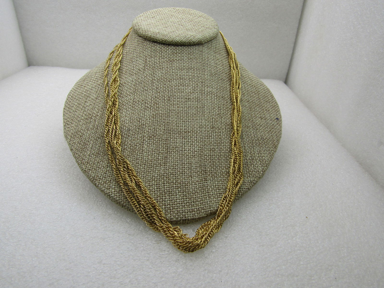 Vintage Double Strand Necklace 42", Gold Tone, 3 mm. 1960's-1970's. A curb link chain that turns: Vintage Double Strand Necklace 42", Gold Tone, 3 mm. 1960's-1970's Reserve: $25.00 Shipping: Domestic: Flat-rate of $6.00 to anywhere within the contiguous U.S. International: Foreign shipping rates a