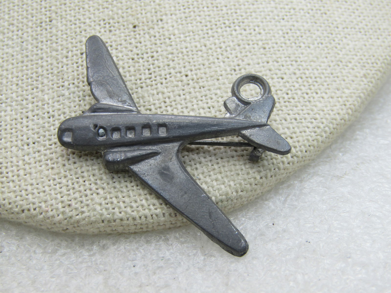 Vintage Cast Metal Airplane Brooch, 1940's, 1.5": Vintage Cast Metal Airplane Brooch, 1940's, 1.5" and appx. 1.75" tall. Passenger plane brooch from pre-mid-century era. In good condition. Not sure of origin. Very good vintage condition. (INV. W8/917