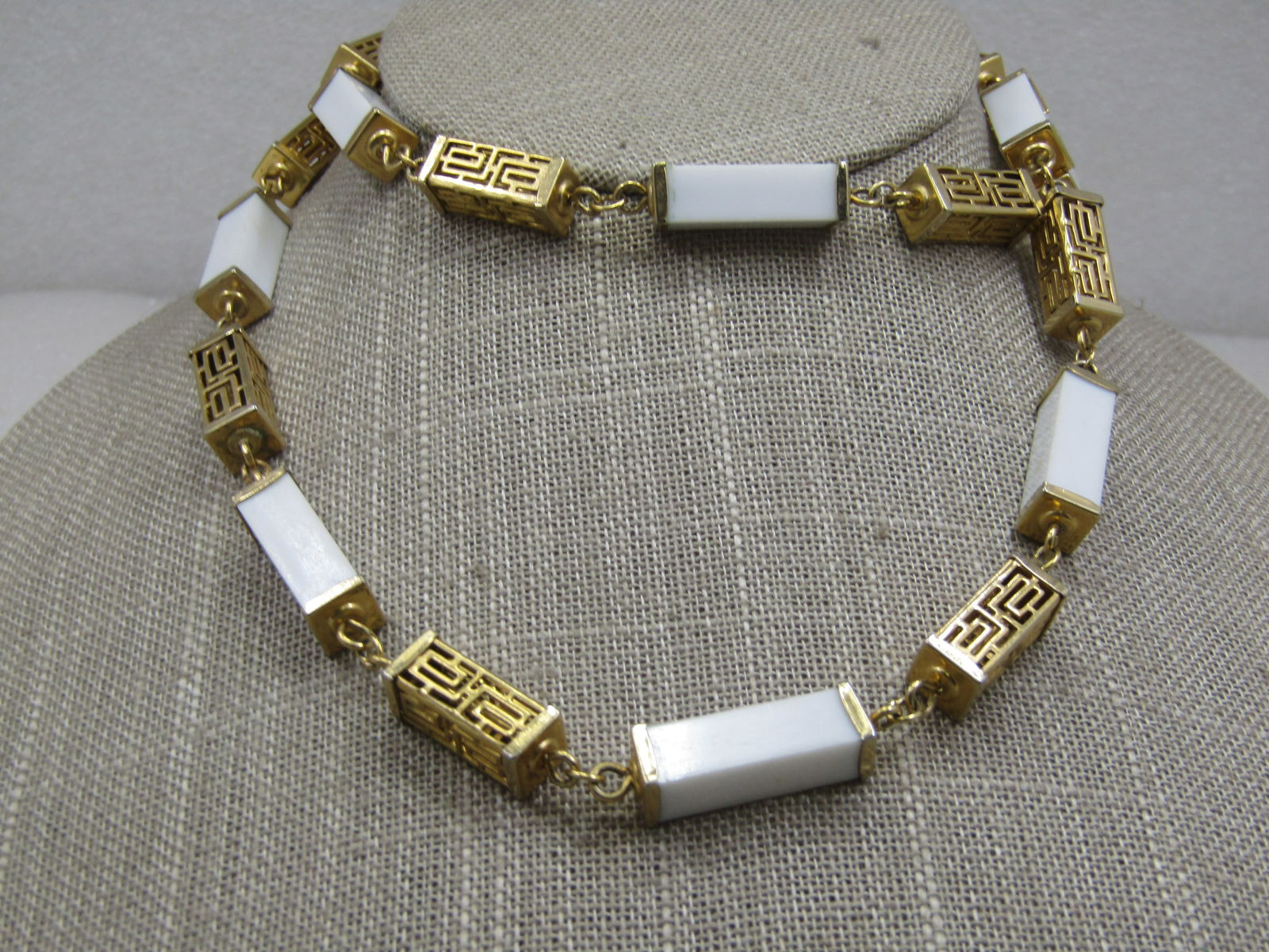 Vintage Asian Filigree Rectangular 3-D Beaded Necklace, 26": Vintage Asian Filigree Rectangular 3-D Beaded Necklace, 26". Gold tone cut-out Asian rectangular beaded links that are appx. 1-1/8" long with the rings one ach end and 6.4mm across the center. The