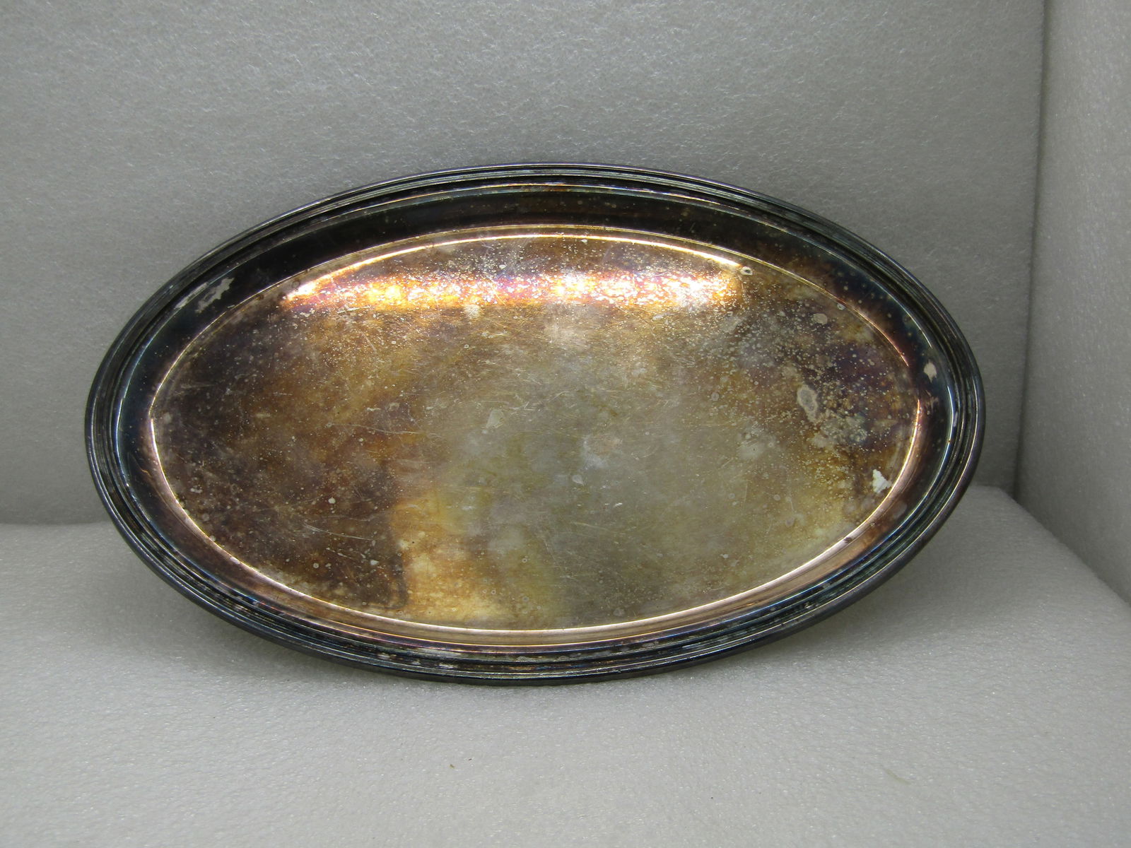 Vintage Pairpoint Silver Plated Tray, EPNS WM Mounts 9.5" Tray, CO1229 #9: Vintage Pairpoint Silver Plated Tray, EPNS WM Mounts 9.5" Tray, CO1229 #9. Ridged edge. Heavy and sturdy. Good to very good condition other than oxidation that will polish away. (INV. 11.2020.1X1 SS34
