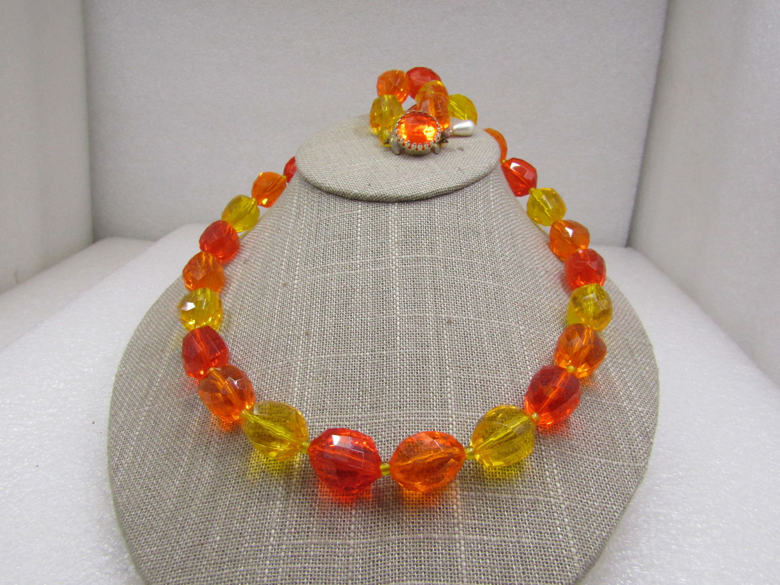 Vintage Western Germany Clear Orange & Yellow Beaded Necklace, 24": Vintage Western Germany Clear Orange & Yellow Beaded Necklace, 24", Mid-Century faceted acrylic beads in bright orange andyellow with an orange round box clasp. They have the look of crystal faceted