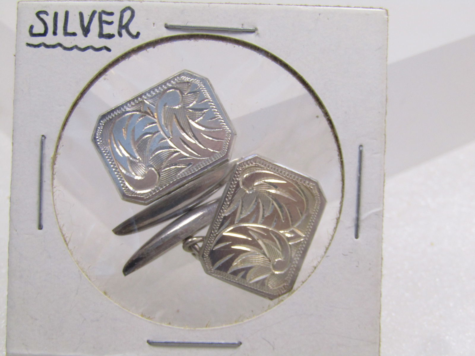 Vintage .800 Silver Engraved Cufflinks, Chain Connector 1930's-1940's: Vintage .800 Silver Engraved Cufflinks, Chain Connector 1930's-1940's. These have the chain that connects to the domed and pointed back that slides through the sleeve. They are marked silver and