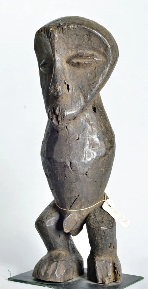 Slit drum African Art rare anthropomorphic Lega Figure Statue Congo drc: Rare slot drum Decorative anthropomorphic wooden sculpture LEGA Tribe - Congo Drc Height 38 cm - About 15 inches Condition: acceptable Reserve: $200.00 Shipping:Domestic: Flat-rate of
