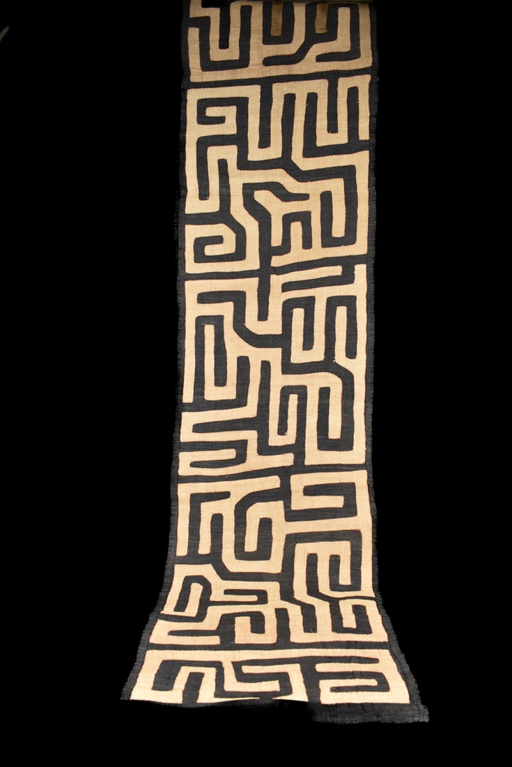 Textile – Cloth – Shoowa-Kuba – DR Congo 360 cm: Kuba skirts, Tcaka, long are cloths made from raffia, from 8 – 25 feet long, from the Ngeende, Bushoong and Ngongo peoples. They incorporate appliqued “patches”, embroidered shapes a