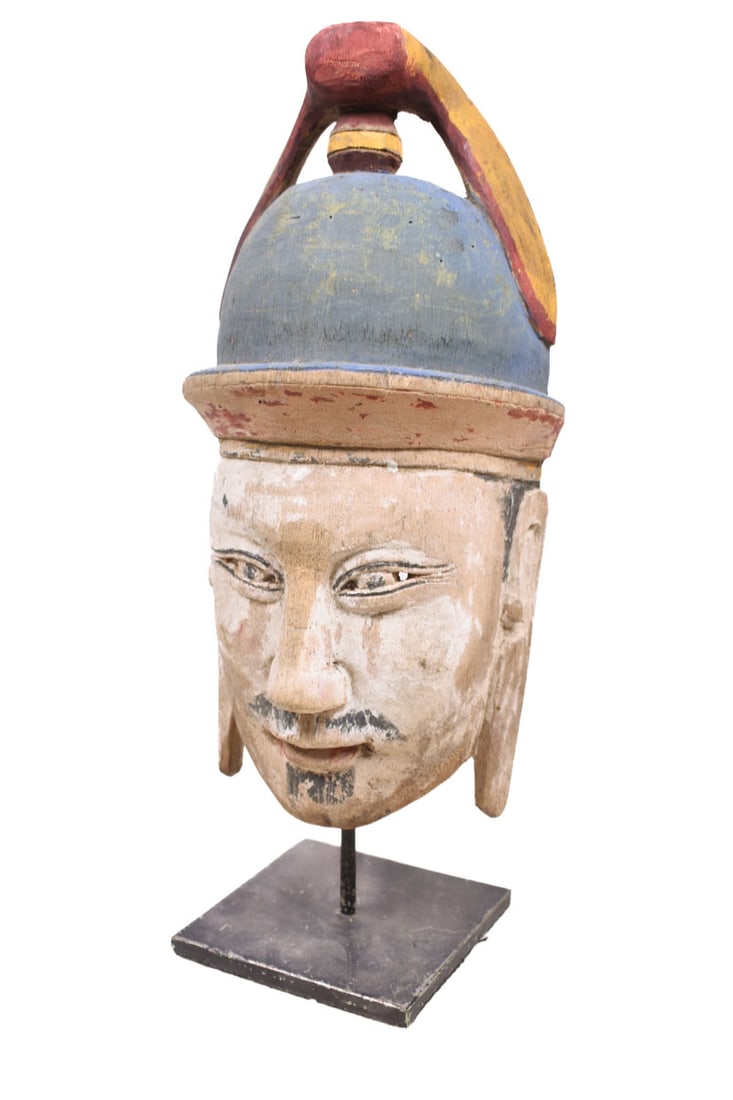 Nuo Mask – Wood – Moanan – China: Ancient mask of the traditional esoteric “Nuo” theater, representing the character of General Guanyu, wearing his helmet. Wood, with multiple superimposed polychrome pigments, meant to