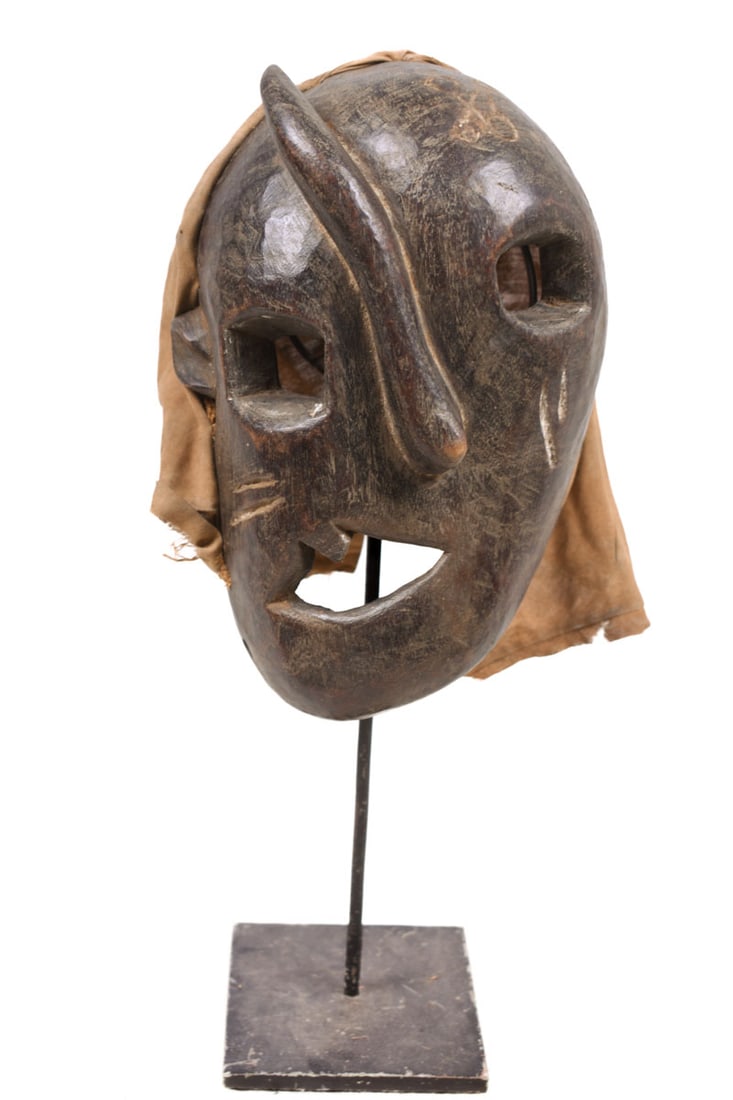 Mask – Wood – West Nepal: Such masks are among the most primitive in use in the world, and are made by carving wood. The shaman plays an important social role as the channeler of spirits for healing, purification, and