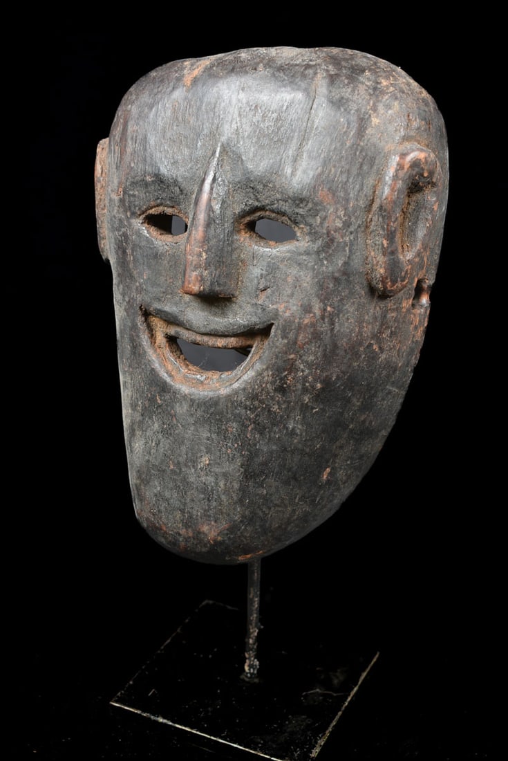Shaman mask – Wood – Nepal: Such masks are among the most primitive in use in the world, and are made by carving wood. The shaman plays an important social role as the channeler of spirits for healing, purification, and