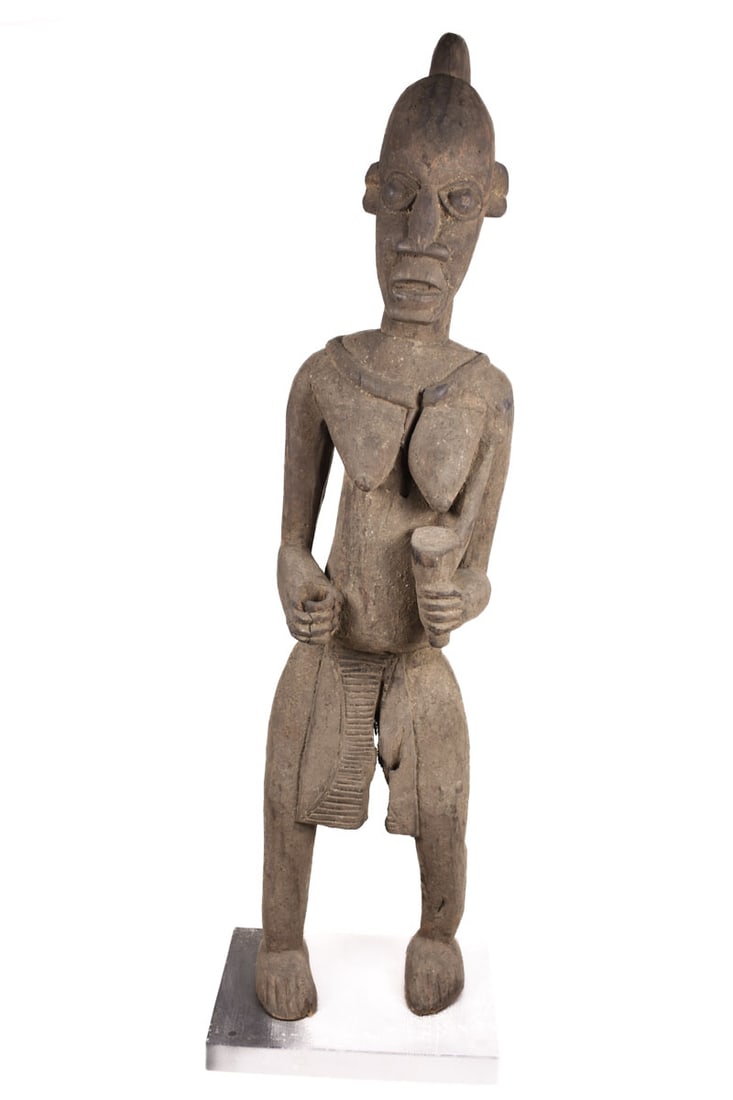 Memorial Figure – Wood – Bangwa – Cameroon: Memorial figures were carved of titled royal wives or princesses, and are often refered to as Bangwa Queens. They were honored as priestesses of the earth cult and were displayed lining the verandas o