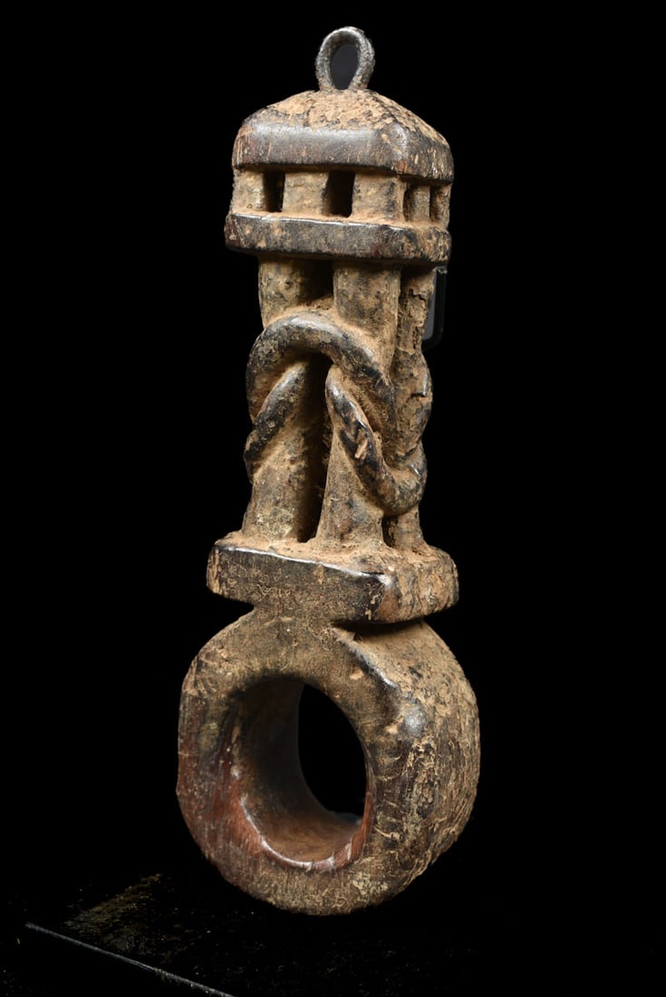 Ghurra – Wood – Nepal: A ‘ghurra’ keeps the churning-rod on its place during the churning of the milk. The Hindu and Buddhist Nepali beliefs in the myth that ‘man & woman’ were created after the