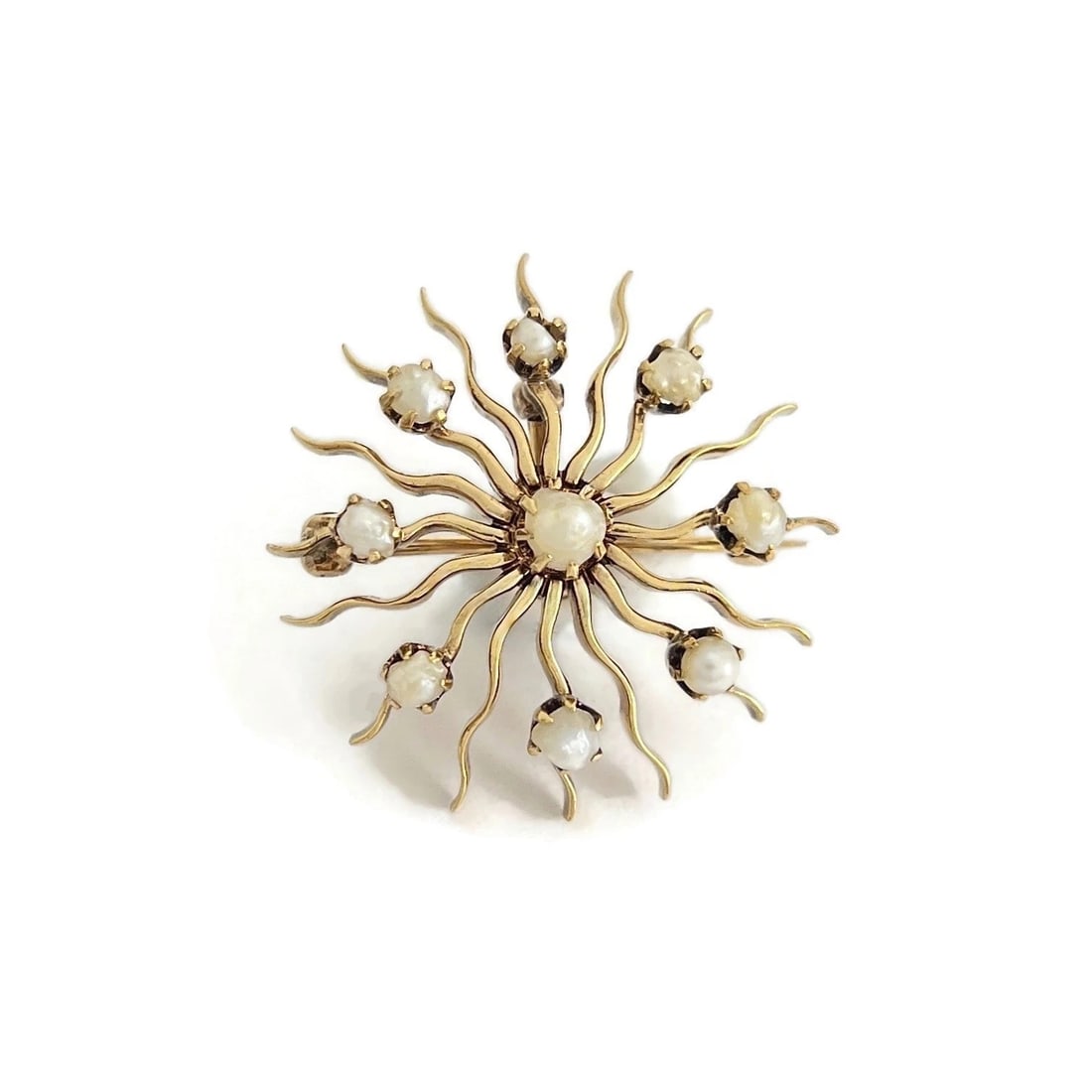 Antique Victorian Pearl Starburst Pendant Brooch 14K Yellow Gold, 6.59 Grams: Antique Victorian Pearl Starburst Pendant Brooch 14K Yellow Gold, 6.59 Grams This is a beautiful one-of-a-kind piece that can be worn as a pendant on a chain or a brooch. Circa: 1885 - 1901; Late Vict