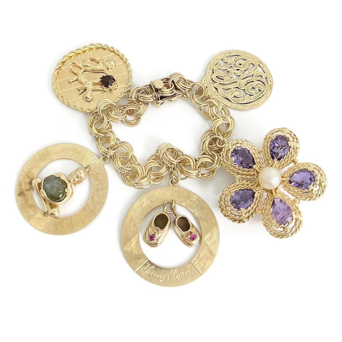 Vintage 1950's Flower Cupid Baby Shoes Charm Bracelet 14K Yellow Gold, 72.44 Gr: Vintage 1950's Flower Cupid Baby Shoes Charm Bracelet 14K Yellow Gold, 72.44 Gr A truly one-of-a-kind vintage charm bracelet! Please do not hesitate to ask any questions. Circa: 1950's - 1960's