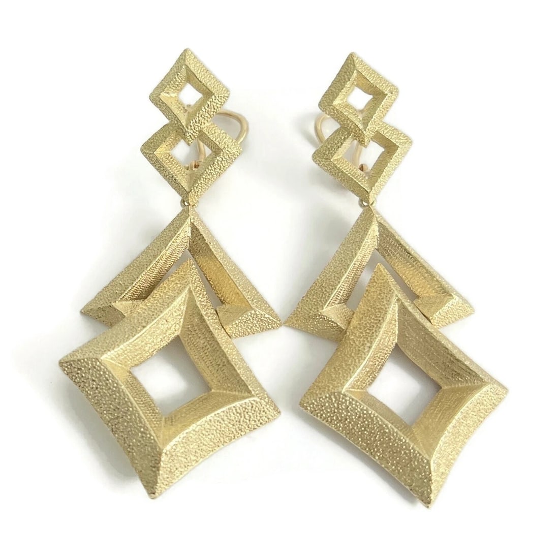 Vintage 1960's Long Geometric Dangle Drop Earrings 14K Yellow Gold, 29.36 Grams: Vintage 1960's Long Geometric Dangle Drop Earrings 14K Yellow Gold, 29.36 Grams These are amazing earrings! Circa: 1960's Metal: 14K yellow gold Weight: 29.36 grams Stamped: 14K Length: 2.75 inches Wi