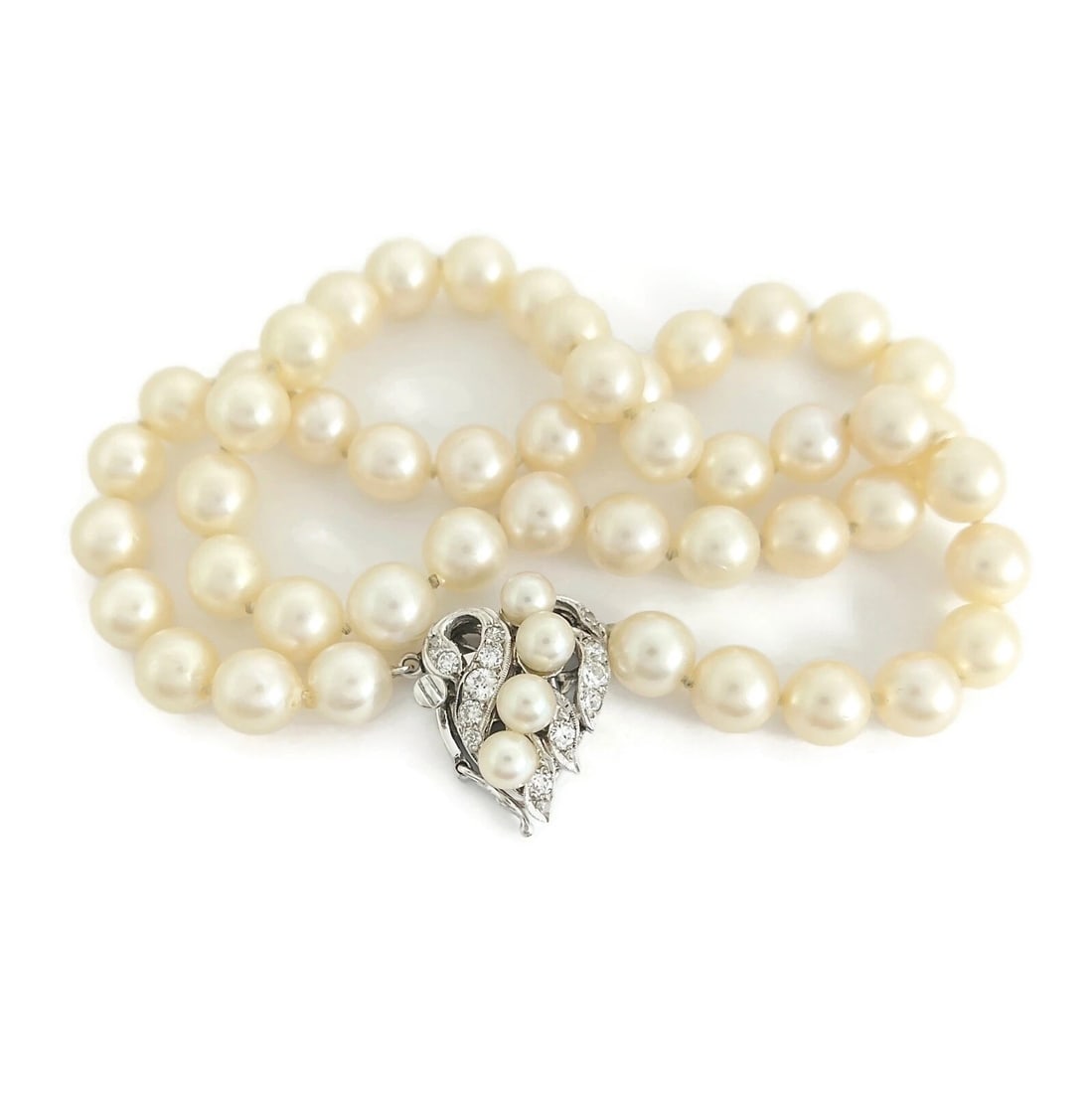 Art Nouveau Japanese Pearl Diamond Necklace 14K White Gold Clasp , 35.34 Gr: Japanese Pearl Necklace 14K Yellow Gold Clasp 18 Inches, 6.4 mm, 23.26 Grams This is a gorgeous pearl necklace! Circa: 1895 - 1910, Art Nouveau Pearls: 47 Japanese cultured pearls, 7.5 mm - 7.8 mm; 4