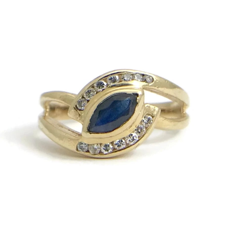 Vintage Marquise Dark Blue Sapphire Diamond Ring 14K Yellow Gold, 2.8 Grams: Vintage Marquise Dark Blue Sapphire Diamond Ring 14K Yellow Gold, 2.8 Grams This ring is a gorgeous estate piece! Gemstone: 1 marquise dark blue sapphire, .35 ct Diamonds: 14 rounds, .14 ctw, G, SI1