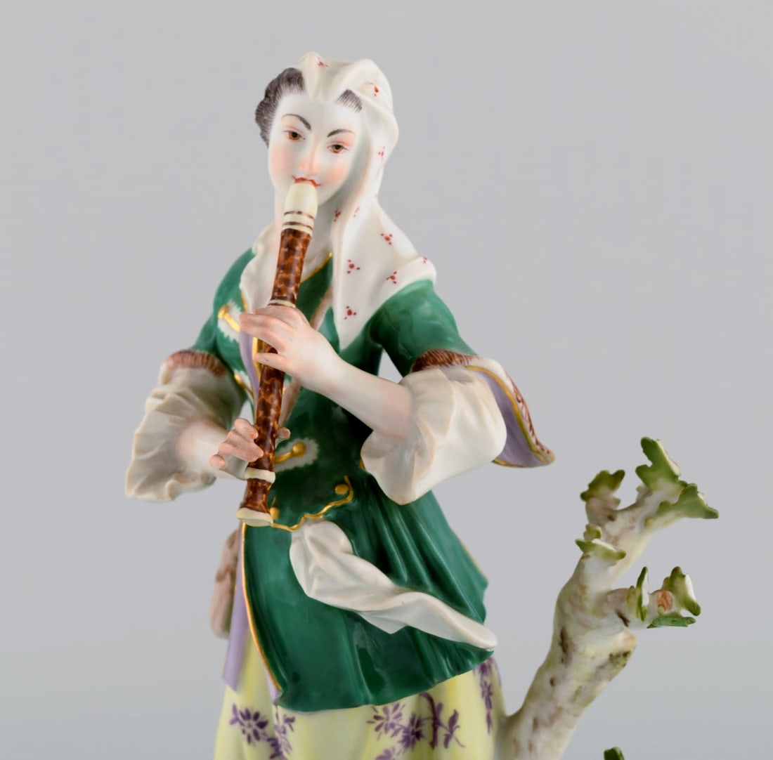 Antique Meissen porcelain figurine. Woman playing flute. Late 19th century. - 2